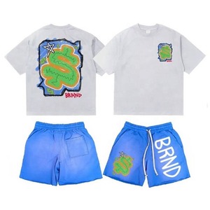 Conjunto Unisex de Camiseta Blanca y Pantalones Cortos Azules, Conjunto Deportivo Informal Transpirable para Hombre, Conjunto de Dos Piezas con Estampado, Camiseta y Pantalones Cortos 100% Algodón - Product Image 1
