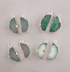 Borde galvanizado de plata a juego Solar cuarzo rebanada par piedras preciosas naturales al por mayor para joyería - Product Image 1