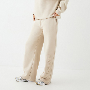 Pantalones deportivos de pierna súper ancha personalizados para mujer, informales, de poliéster y algodón, holgados, estilo jogger, al por mayor, OEM, para mujer - Product Image 1