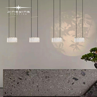 Lustre moderne minimaliste à plusieurs têtes à LED Lumière d'ambiance de luxe pour table à manger restaurant