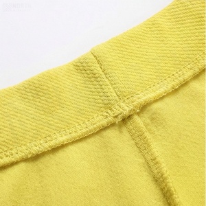 Minifalda de Cintura Alta para Mujer, Corte en A, Color Amarillo Sólido, Estilo Casual, 100% Poliéster, Tejido Cómodo para Usar en Todas las Estaciones - Product Image 4