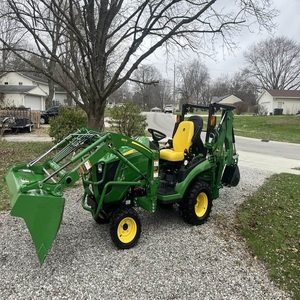 Tractores utilitarios subcompactos John Deere 1025R con cargador frontal, plataforma de corte y retroexcavadora en venta - Product Image 1