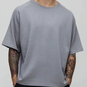 Camiseta de algodón grueso para hombre, de corte holgado, hombros caídos, estilo casual y urbano para verano. - Product Image 1