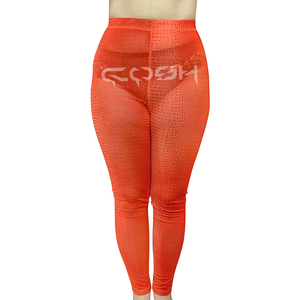 Leggings COSH con Estampado de Piel de Cocodrilo Naranja - Pantalones de Yoga de Cintura Alta con Patrón Animal Texturizado para Mujer - Product Image 1