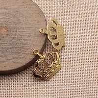 Colgante de Corona Real de 27x24mm, de Aleación de Zinc Plateado Antiguo, con Diseño Calado y Puntos, para Pulsera de Cumpleaños de Princesa