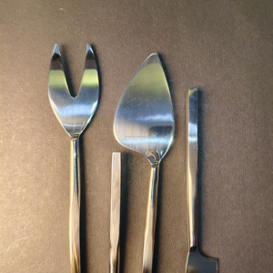 4-Piece Slim-<b>Handle</b> Artisan Cheese Set Pronged fork, heart-shaped knife, flat <b>shovel</b>, and spreader with slim, organic <b>handles</b>. - Product Image 3