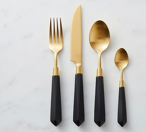 Juego de cubiertos modernos de acero inoxidable dorado con mangos negros, perfecto para utensilios de cocina y vajilla. - Product Image 1