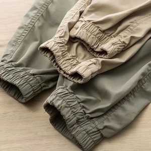 Pantalon de survêtement décontracté pour homme, taille élastique, cordon de serrage, poches latérales, léger, en polyester, toile unie, respirant, pantalon d'été - Product Image 4