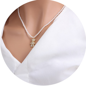 Collier pendentif de mode de conception rétro coréenne Wenchi, visage souriant, étoile, perle, œil du diable, chaîne de clavicule, collier haut de gamme, modèle - Product Image 5