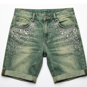 โรงงานผลิตกางเกงยีนส์ขาสั้นประดับเพชรเทียม พร้อมบริการตัดเย็บขั้นสูง ตกแต่งอย่างดี พร้อมส่งออก - Product Image 1