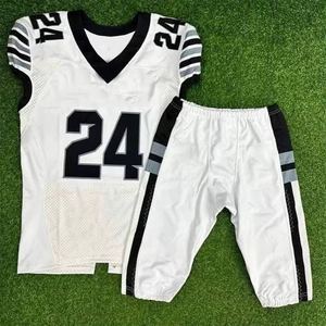 เสื้อฟุตบอลอเมริกันแบบสั่งทำรุ่นใหม่ พร้อมปักชื่อและหมายเลขผู้เล่นด้วยเทคนิค Tackle Twill ชุดยูนิฟอร์มอเมริกันฟุตบอล - Product Image 4