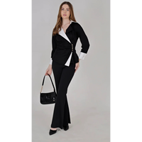 Ensemble asymétrique noir Executive : Blazer peplum à revers contrastant monochrome et pantalon évasé