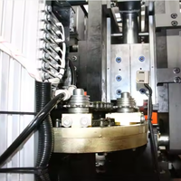 Machine de soufflage par injection semi-automatique à 4 cavités, moteur Mitsubishi PLC 50 kW pour bouteilles d'eau minérale en PET/PC/PP/SMC