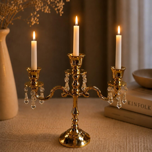 Gold polished metal three <b>light</b> candelabra stand featuring clear crystal droplet beads, available at wholesale prices. - Product Image 1