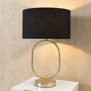 Lampe de table Orbit Loop en métal avec cadre ovale, abat-jour en lin noir, finition or brossé, lumière ambiante chaude, décoration élégante - Product Image 4