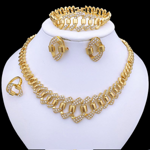 Regal scrollwork gold set including a <b>matching</b> <b>bracelet</b> and statement ring, available at wholesale prices. - Product Image 6