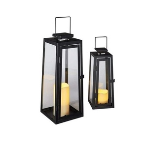 Lanterne à bougie en métal, accent décoratif artistique pour la maison, conçue pour sublimer la décoration résidentielle avec une lumière d'ambiance chaleureuse. - Product Image 6