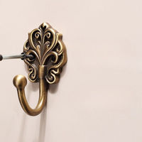 Porte-manteau mural auto-adhésif à 1 crochet en laiton massif de qualité supérieure, moderne, polyvalent et durable pour chambre et salle de bain