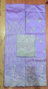 La tradicional y atemporal tela de tafetán George Wrapper nigeriana con adornos de piedras y un intrincado patrón de recortes sobre un diseño floral. - Product Image 6