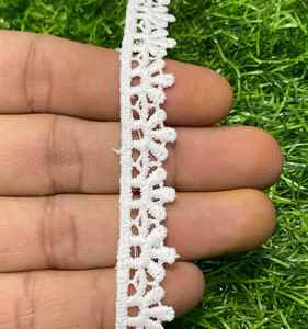 Atractivo encaje de algodón con acabado impecable y calidad de tela duradera para marcas de moda. - Product Image 1