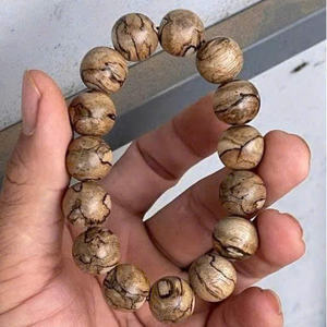 กำไลลูกปัดไม้กฤษณาเวียดนามคุณภาพสูง งานแฮนด์เมดสไตล์วินเทจ ลูกประคำสำหรับสวดมนต์ รับผลิตแบบ OEM ODM จำหน่ายส่งในราคาที่แข่งขันได้ดีที่สุด - Product Image 1