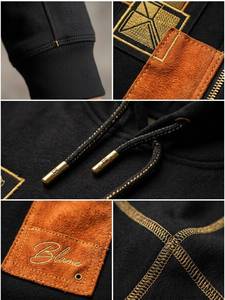 Sudadera con Capucha Negra para Hombre con Diseño de Parches Naranjas, Estilo Urbano, Material de Forro Polar, para Otoño - Product Image 6