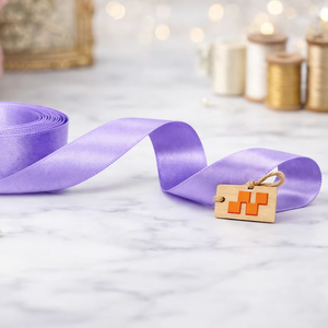 ริบบิ้นผ้าซาตินโพลีเอสเตอร์สีแดงขนาด 12 มม. ยี่ห้อเนลกามัล อินดัสทรีส์ 100% แบบสองหน้า สำหรับตกแต่งเสื้อผ้า งานเย็บปักถักร้อย และงานฝีมือ - Product Image 1