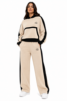 Ensemble de survêtement pour femme avec sweat à capuche oversize en tissu haute densité et pantalon de survêtement à jambe large à rayures assorties, style athleisure OEM, vente en gros
