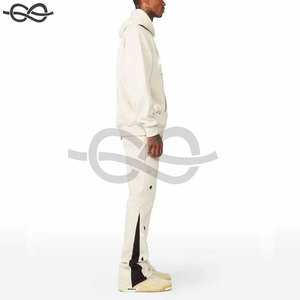 Conjunto Deportivo de Dos Piezas para Hombre, Estilo Patchwork Colorido, Sudadera con Capucha y Pantalones Jogger Acampanados, Diseño Moderno - Product Image 2