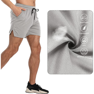 Shorts de sport pour hommes en polyester uni, personnalisables en gros, OEM, haute qualité, avec cordon de serrage à la taille et poches latérales, séchage rapide - Product Image 4