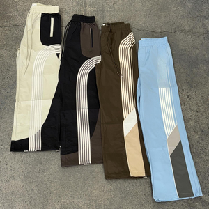 ชุดเซ็ตแทรคสูทผู้ชายแบบกันน้ำสำหรับฤดูใบไม้ร่วง/ฤดูหนาว  ผ้าไนลอนสองชิ้น พร้อมเสื้อแจ็คเก็ตทรงหลวมและกางเกงขายาว  รับสกรีนโลโก้ได้ - Product Image 3