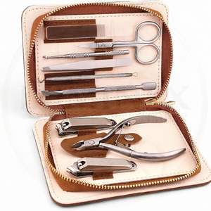 ชุดอุปกรณ์ทำผมมืออาชีพ 9 in 1 พร้อมกรรไกรตัดเล็บสแตนเลสคมกริบ ตะไบนาโน คีมตัดหนังกำพร้า กรรไกรตัดผม แหนบ และกรรไกรซอยผม - Product Image 1