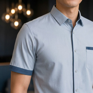 Chemise unisexe à manches courtes bleu clair avec pantalon marine en coton respirant sans coutures pour adultes - Product Image 2