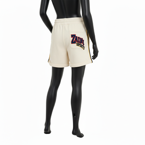 กางเกงบาสเก็ตบอลขาสั้นผู้หญิง ผ้าฟลีซโพลีเอสเตอร์พรีเมียม สีครีม เนื้อผ้านุ่ม แถบข้างผ้า แถบข้างผ้าลายทาง  โลโก้ปักแบบเชนิลล์ - Product Image 3