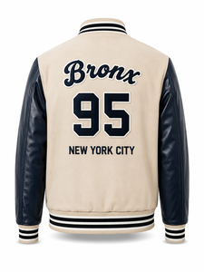Chaqueta Varsity Unisex Beige con Mangas de Cuero Azul Marino, Letra B Bordada en el Frente, Cuello Camisero, Corte Regular, Diseño de Parches Invernal - Product Image 2