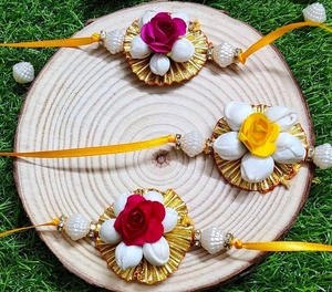 Handcrafted Floral Rakhi <b>Set</b> with Vibrant Roses and Elegant Pearl Accents for Rakshabandhan Celebrations - Product Image 1