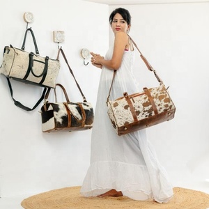 กระเป๋าเดินทางหนังวัววินเทจสำหรับผู้ชายและผู้หญิง - Product Image 1