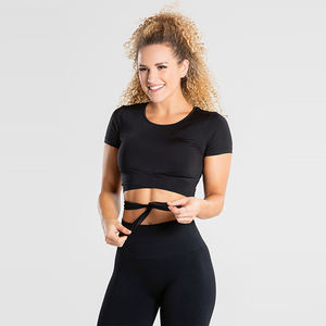 Venta al por mayor de ropa deportiva de verano para mujer, diseño de cuello corto, elástica, ligera, 180 g/m², de secado rápido, ajuste ceñido, personalizada y lisa, la más vendida. - Product Image 1