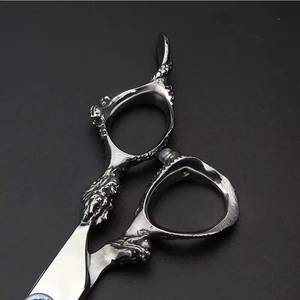 Ciseaux de coiffure professionnels Morje Surgical en acier inoxydable 440C, lame tranchante, manche moyen, pour droitiers, 28 dents - Product Image 6