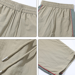 Pantalon coupe-vent personnalisé pour femme avec logo, pantalon de survêtement en nylon respirant pour femme avec empiècements latéraux, idéal pour l'été - Product Image 6