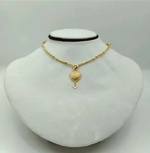 Exquisito Collar Chapado en Oro de 22K para Mujer con un Romántico Colgante de Filigrana en Forma de Corazón y Cuentas de Oro con Textura Intrincada - Product Image 1