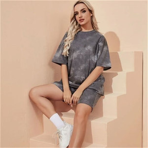 Ensemble T-shirt décontracté uni coupe classique et short large pour femme avec poches, 100 % coton respirant, idéal pour l'été - Product Image 1