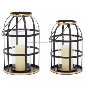 Linternas con marco de metal negro, Juego de 2 candelabros hechos a mano de hierro forjado, linterna para decoración navideña del hogar y el jardín - Product Image 1