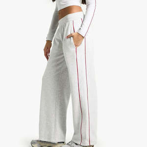 กางเกงขายส่ง OEM แบบสั่งทำพิเศษสำหรับผู้หญิง ทรงขาบาน สไตล์ไฮสตรีท ลายเพ้นท์ ผ้าฝ้ายฟลีซ 100% ทรงปกติ สวมใส่สบาย เหมาะสำหรับชุดลำลองและชุดกีฬา - Product Image 5