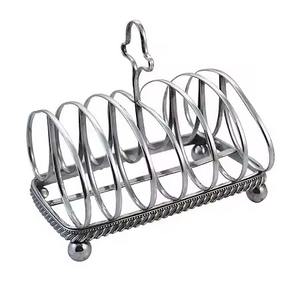 El soporte metálico para tostadas de excelente calidad es versátil lo suficiente como para sostener bagels, crumpets o rebanadas de pan artesanal. - Product Image 1