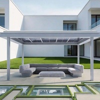 Pergola autonome à lames orientables avec structure en métal graphite et couverture imperméable pour zones de détente dans les jardins