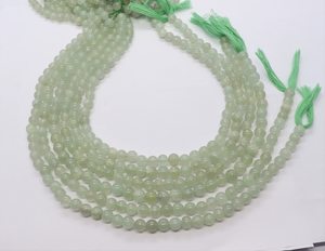 ลูกปัดหยกอังกุรีธรรมชาติทรงกลมเรียบ ขนาด 6.5-7 มม. ลูกปัดหยกสีเขียวทรงกลม 13 นิ้ว หยกอังกุรีแบบเรียบสำหรับทำเครื่องประดับ - Product Image 1