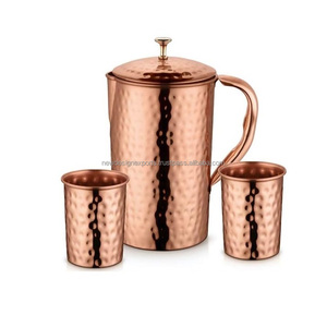 Pichet en cuivre pur 100% fabriqué à la main 2 verres verres jetables en métal écologiques pour la santé potable martelée ayurvédique - Product Image 1