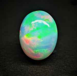 Gema de ópalo etíope suelta de 7x5 mm - Gemas de ópalo Welo de forma ovalada multicolor - Piedra de ópalo lisa para joyería - Product Image 2