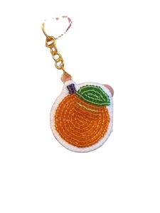 พวงกุญแจลูกปัดเมล็ดสีเหลืองและสีดำพวงกุญแจลูกปัดทำด้วยมือดีไซน์รูปเป็ดที่สวยงามสำหรับเด็กผู้หญิงจากอินเดีย - Product Image 2